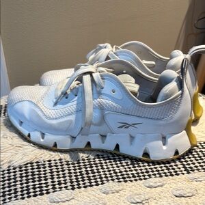 Reebok White Mesh Athletic Sneakers with Yellow Accents